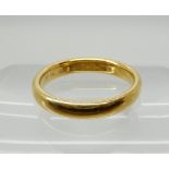 A 22ct gold wedding ring size P1/2, weight 5.9gms Condition Report: Available upon request