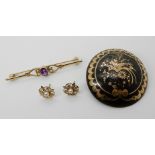 A 9ct gold amethyst brooch, a pair of yellow metal pearl earrings and a pique wear brooch (af) total