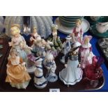 A Coalport figure of a lady and assorted other continental figures Condition Report: Available