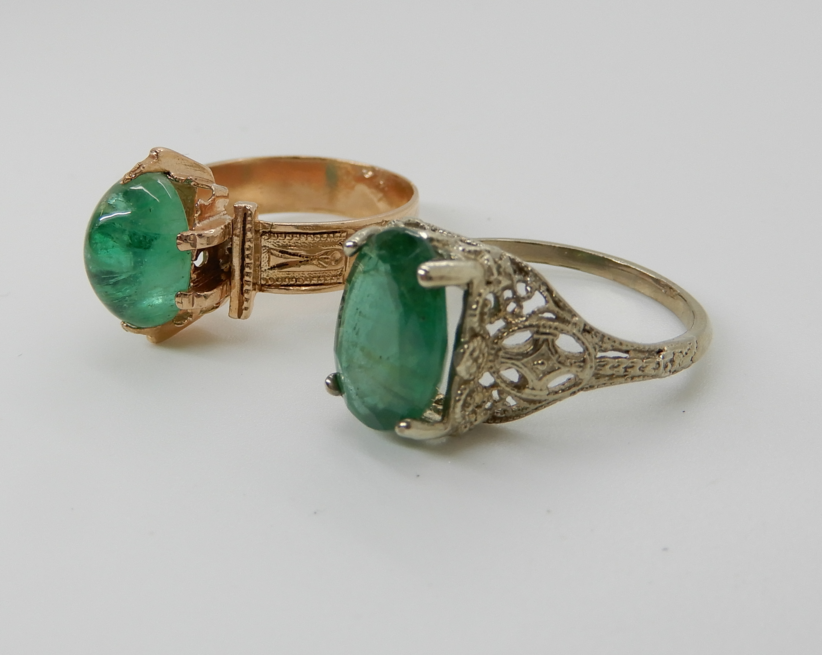 Two yellow metal rings set with green gemstones, pierced example N1/2, other size M, weight 6.4gms - Image 2 of 3