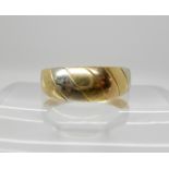 An Italian made three colour gold ring, size approx V, weight 5.7gms Condition Report: Available
