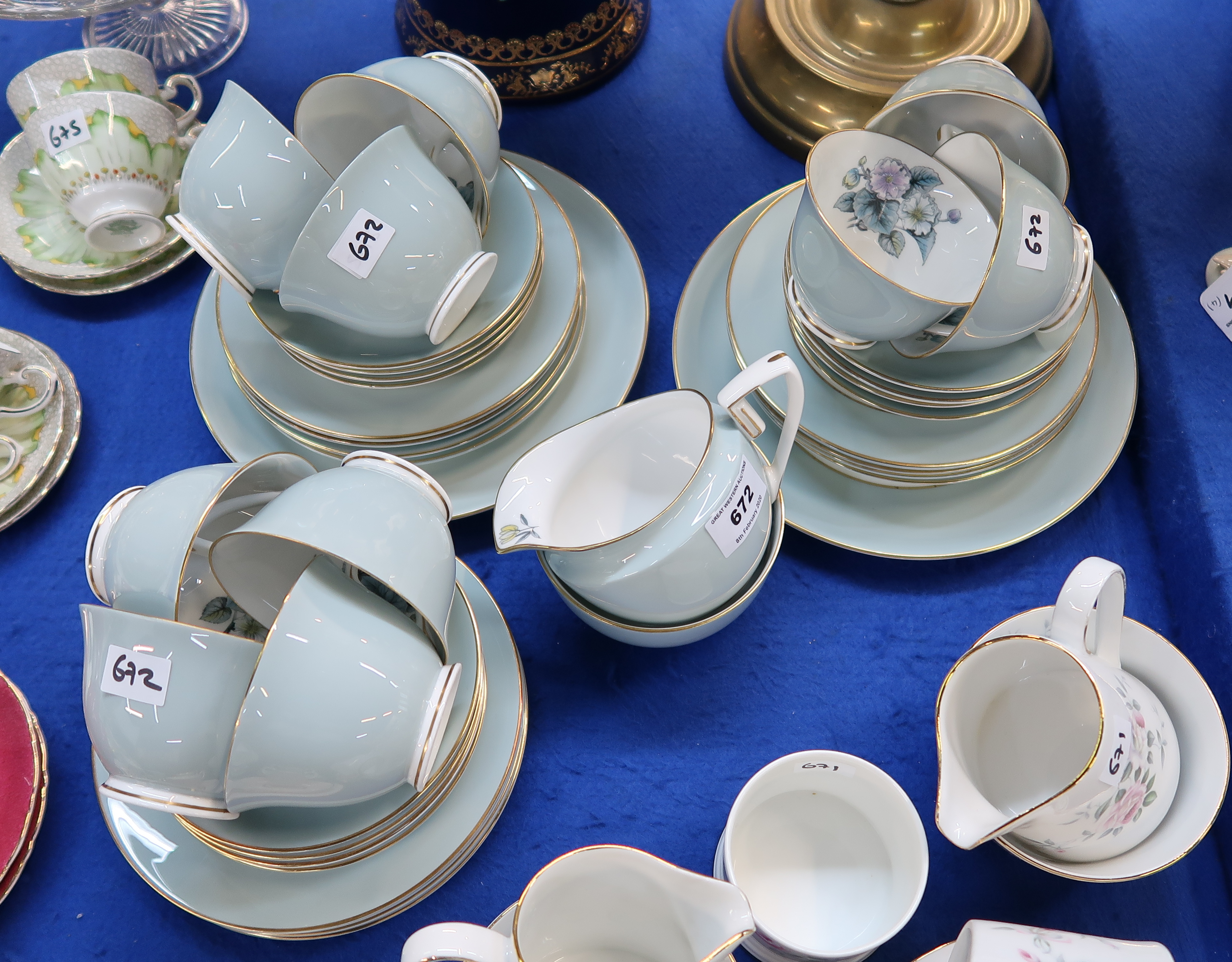 A Royal Worcester Woodland pattern teaset comprising ten cups, twelve saucers, plates, two cake