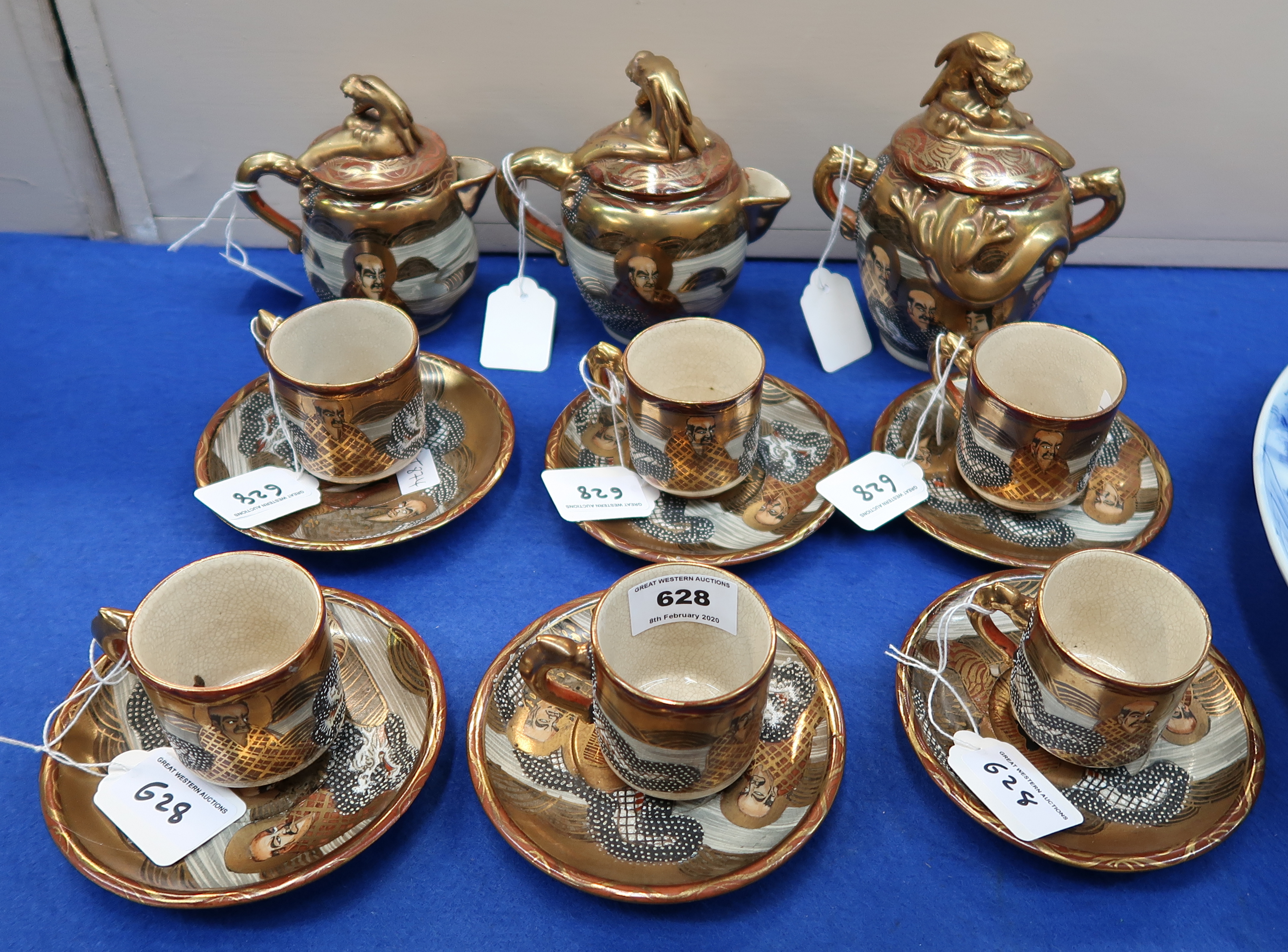 A Satsuma coffee set with six cups and saucers, two jugs and a sugar pot Condition Report: Available