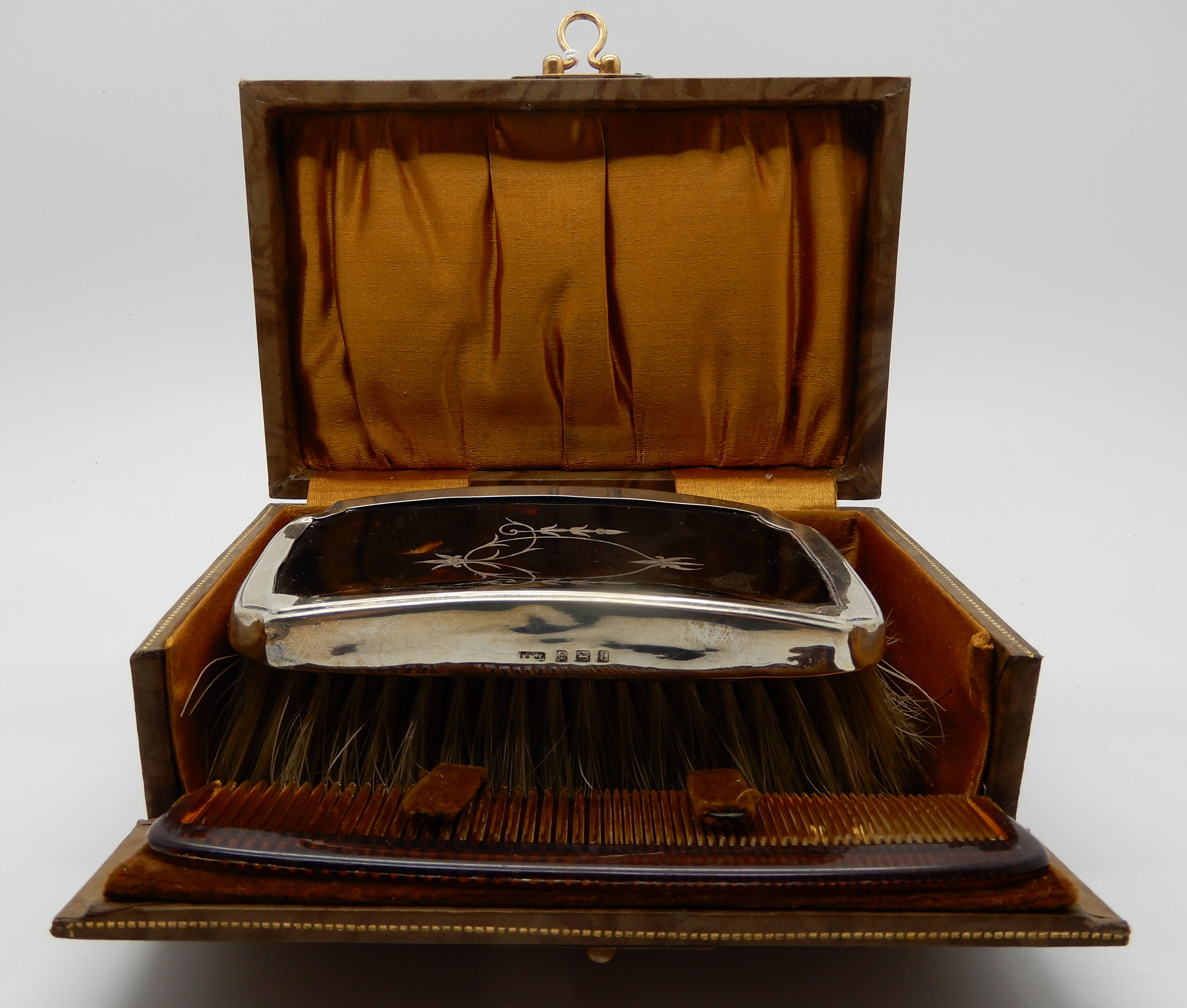 A lot comprising a cased silver and tortoiseshell brush, Birmingham 1926 and a silver and - Image 2 of 3