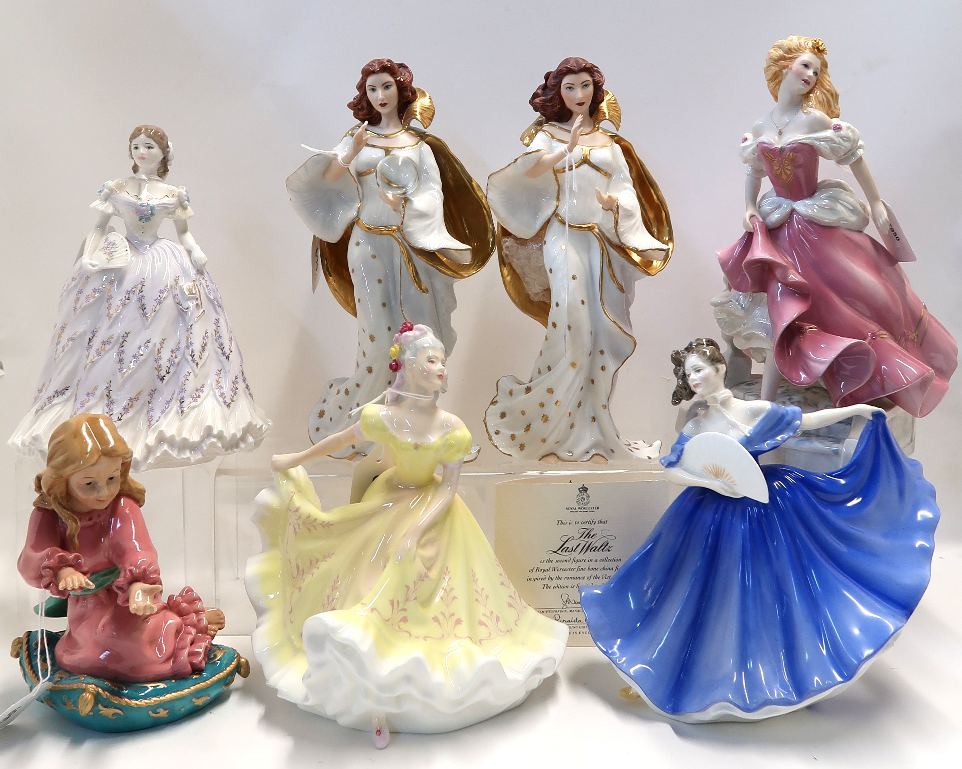 Two Royal Doulton figures Ninette and Elaine, a Royal Worcester figure The Last Waltz, three