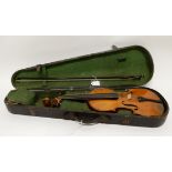 A two piece back violin 35.25cm bearing label to the interior R. Guiton, Cork, 1886 with a bow and