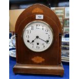 An inlaid mantle clock Condition Report: Available upon request