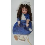 A Simon & Halbig for KR bisque-headed doll with open and close brown eyes, open mouth, pierced