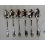A set of six silver dessert spoons, Edinburgh 1812, fiddle pattern, the terminal with shell motif