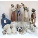 Assorted Lladro and Nao figures including girls, dogs, doves etc Condition Report: girl with blue