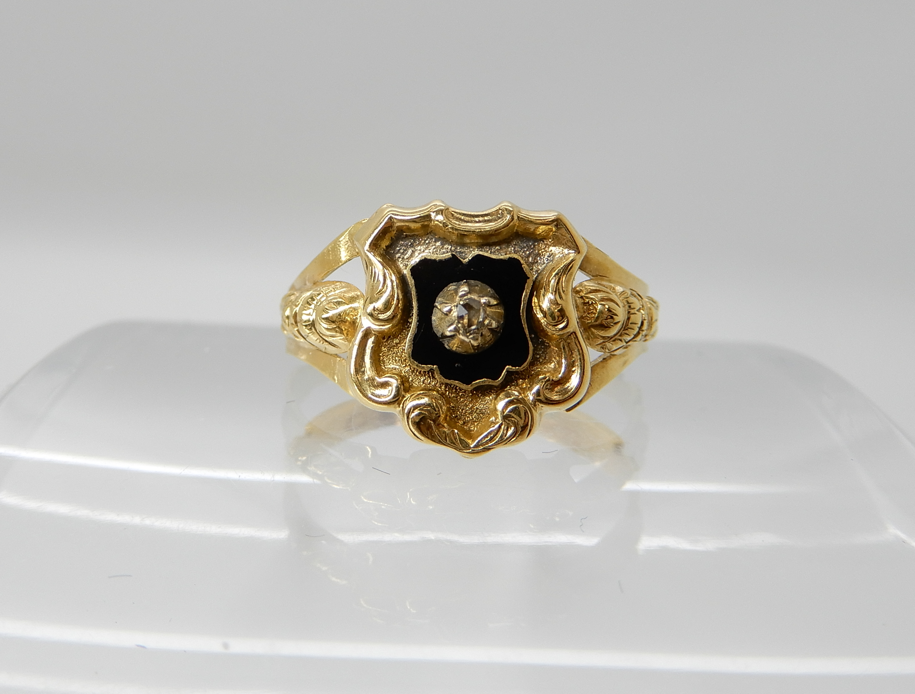 *WITHDRAWN* An 18ct gold Victorian mourning ring, with black enamel and a rose cut diamond,