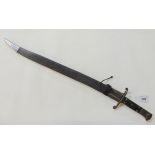 A sword bayonet in scabbard, overall length 70cm Condition Report: Available upon request
