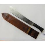 A jungle machete in leather scabbard, the blade marked with a logo and Legitimus Collins &