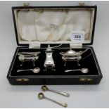 A cased three piece silver condiment set, Sheffield 1964 Condition Report: Available upon request