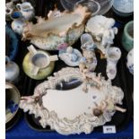 A continental cherub mirror, a Moore's figural pot, a Nautilus style planter etc Condition Report: