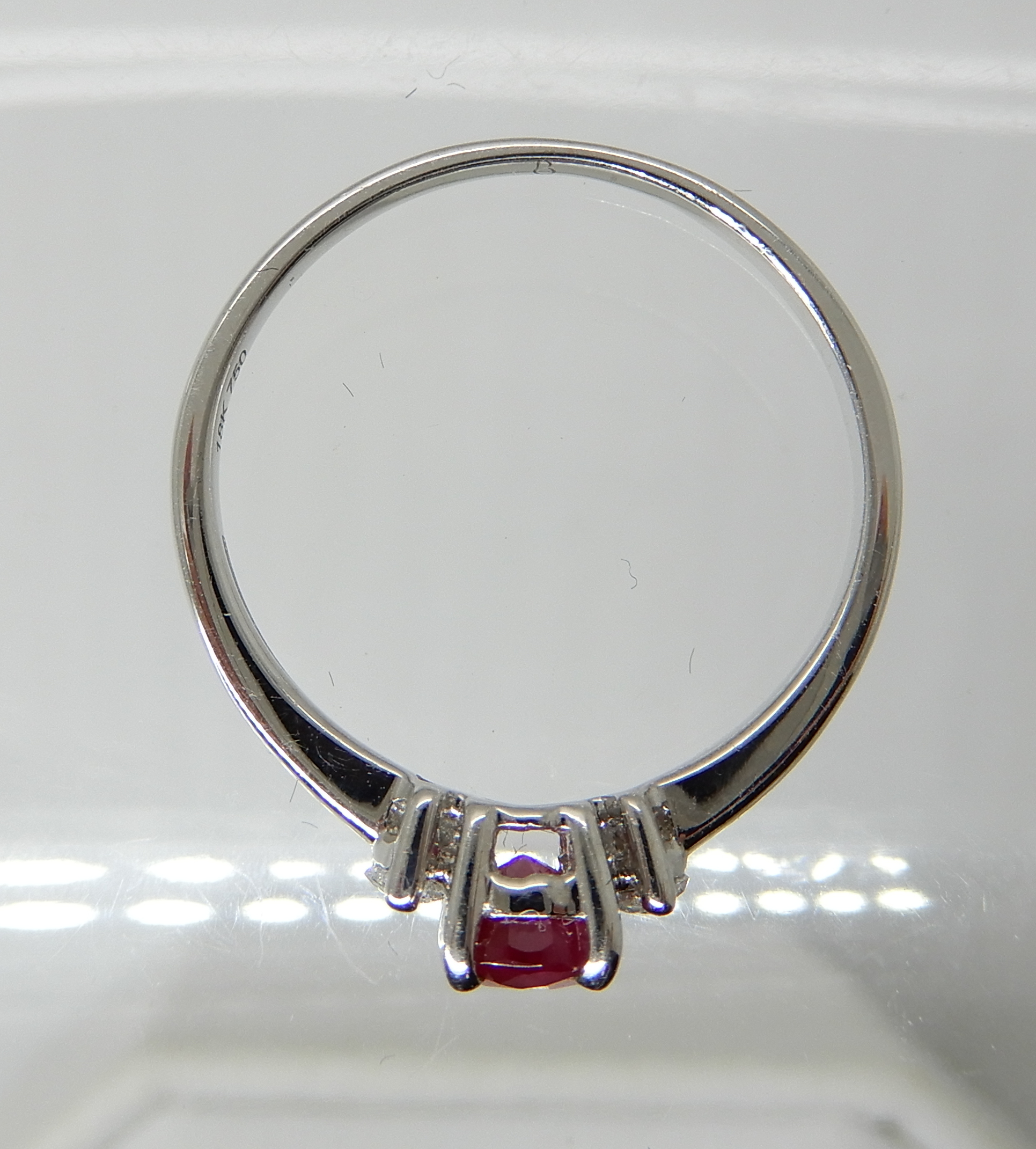 An 18ct white gold ruby and diamond ring, dimensions of the ruby 5.9mm x 4mm x 3.1mm, with marquis - Image 2 of 4