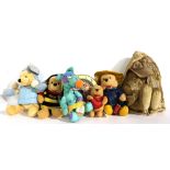 A collection of modern Winnie the Pooh soft toys Condition Report: Available upon request