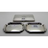 A lot comprising a silver cigarette case and a pair of silver dishes, Birmingham 1945, 10cm x 7.3cm,