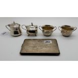 A lot comprising a pair of silver salts, Birmingham 1881, two silver mustard pots, Birmingham 1912
