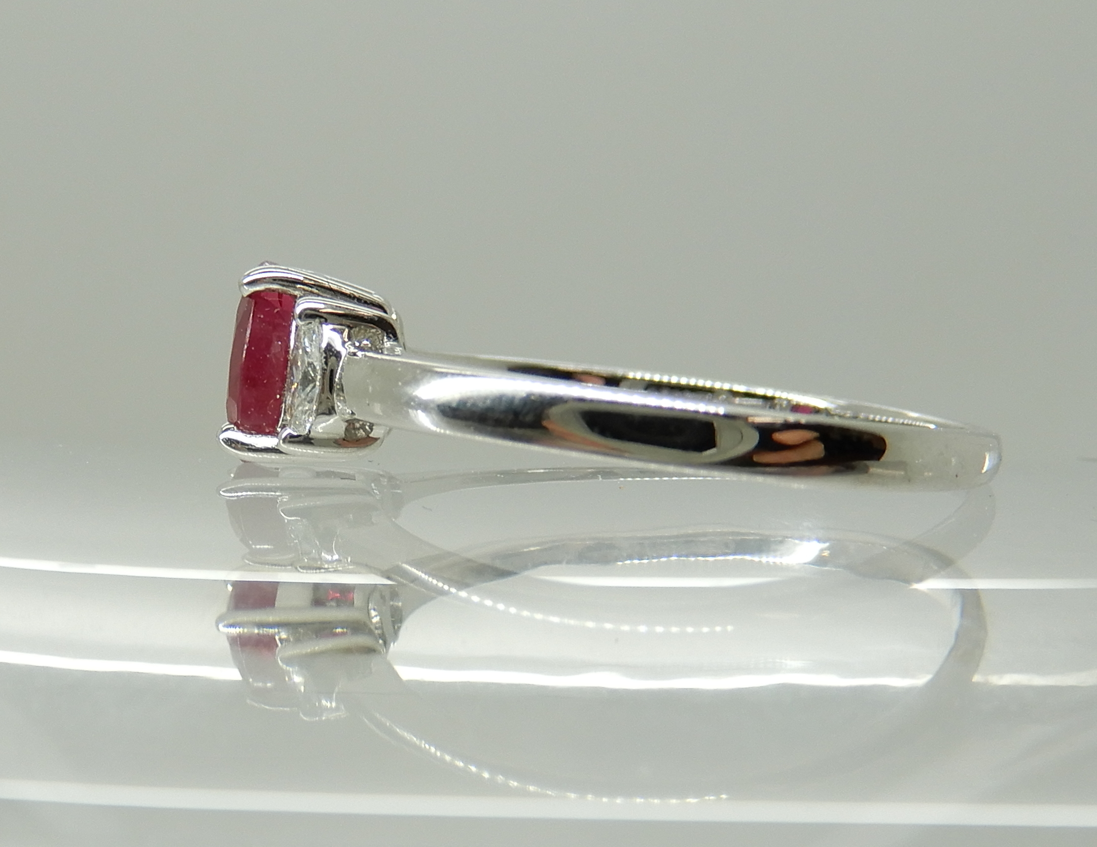 An 18ct white gold ruby and diamond ring, dimensions of the ruby 5.9mm x 4mm x 3.1mm, with marquis - Image 4 of 4