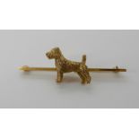 A 9ct brooch of a terrier dog, length 5cm, weight 6.9gms Condition Report: Available upon request