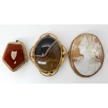 A 9ct cameo brooch, and a yellow metal mounted agate locket and brooch Condition Report: Available