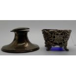 A lot comprising a Capstan shaped silver inkwell, Birmingham marks and a silver sugar bowl with blue