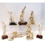 Seven carved ivory figures including a figure and children Condition Report: Available upon request