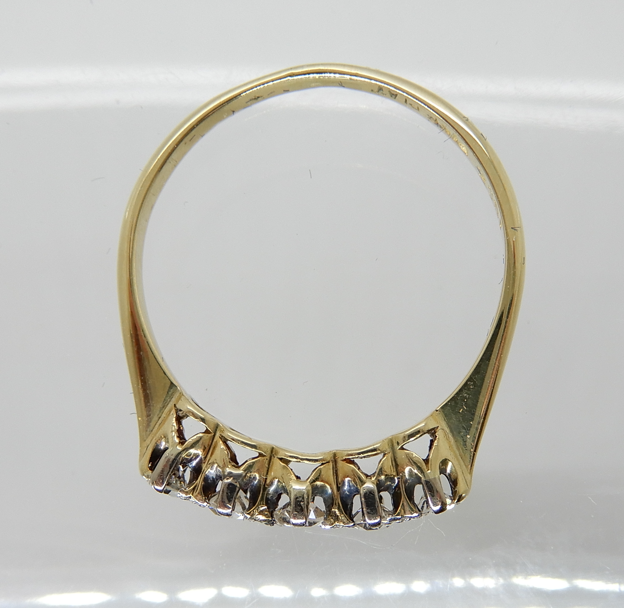 An 18ct gold five stone diamond ring, size P, weight 2.4gms Condition Report: middle diamond has a - Image 2 of 3