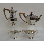 A four piece silver tea service, London 1938, with faceted body and gadrooned border, 1402gms