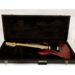 A Japanese electric guitar by Asama in red stain finish, with a hard case Condition Report: