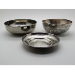 A lot comprising an Eastern silver bowl and two white metal bowls, silver bowl 11cm diameter,
