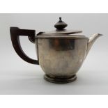 A silver teapot (def), Birmingham 1936, 11.5cm high, 288gms Condition Report: Available upon