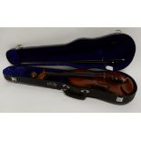 A Czechoslovakian two piece back violin 35cm with a violin bow 68cm and a case Condition Report: