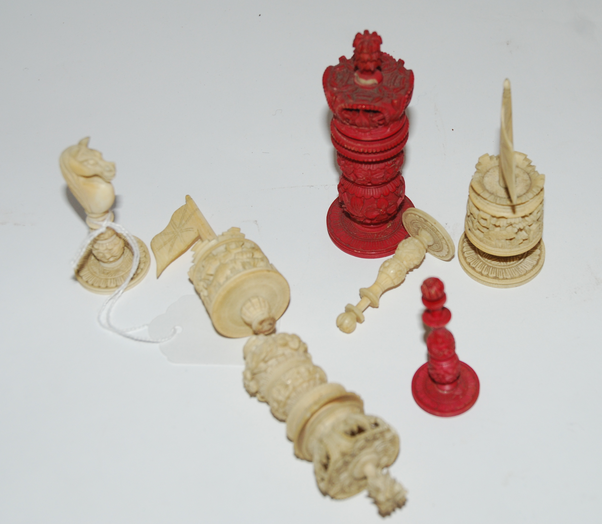 A small collection of carved chess pieces (def) Condition Report: Available upon request