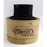 A black top hat, by Tress & Co, 6 7/8" box Condition Report: Available upon request