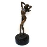 A bronzed female nude on slate base, indistinctly signed, 30.5cm high Condition Report: Available