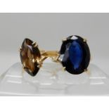 A 9ct gold faux sapphire ring size P1/2 and a 9ct marquis shaped smoky quartz ring size P1/2, weight