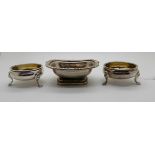 A lot comprising a pair of silver salts, London 1765 and a single silver salt, London 1926 (3),
