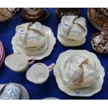 An Old Royal Bone China teaset decorated with lupins comprising twelve cups, saucers and plates, two