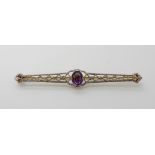 A 14k yellow and white gold amethyst brooch, length 6.3cm, weight 3.6gms Condition Report: Available