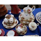 A Royal Albert Old Country Roses tea and dinner service comprising teapot, six cups, seven