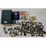 A collection of GB pre-decimal coins, foreign coins and banknotes in a book box "International