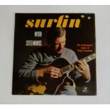 A box of vinyl LP records to include Surfin' with Steenhuis, Stray Cats, Duane Eddy, Del Shannon,