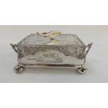 A silver plate and cut glass sardine dish and cover, 20cm across the handles Condition Report: