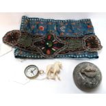 Embroidered silk panel, beaded and needlework panel, compass, curling stone inkwell etc Condition