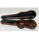 A one piece back violin 35.25cm inscribed to the interior 8853 together with a violin bow bearing