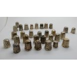 A lot comprising thirty one thimbles, various makers and marks including two by Charles Horner,