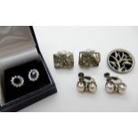 A pair of silver cufflinks set with pyrite, a pair of Miriam Haskell faux pearl earrings, a