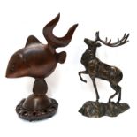 A Chinese wooden fish and a bronzed model of a stag Condition Report: Available upon request